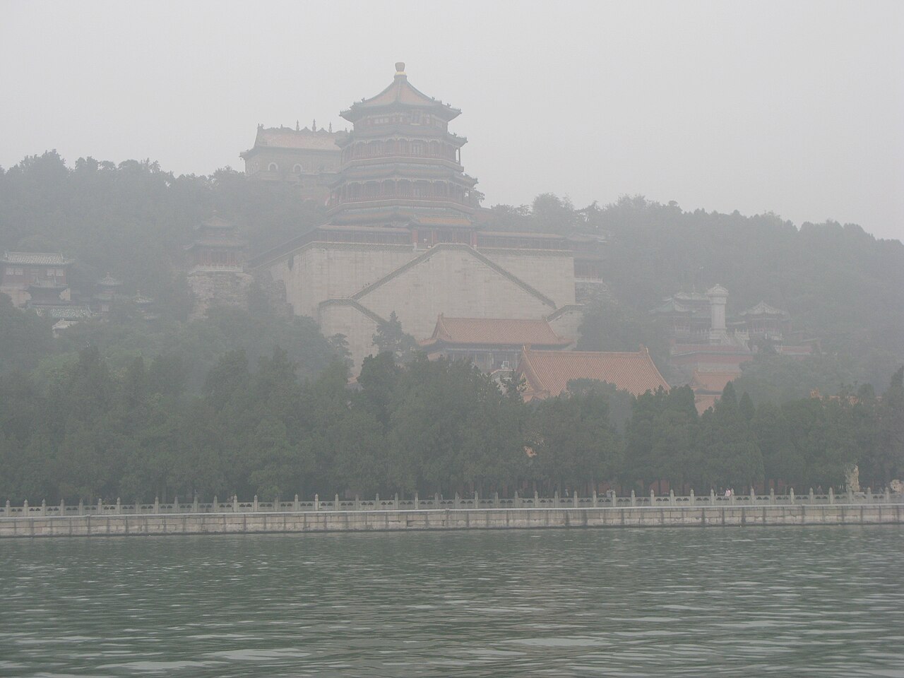Long Corridor gallery and the Kunming Lake of the Summer Palace with forested Longevity Hill beyond, Beijing, China