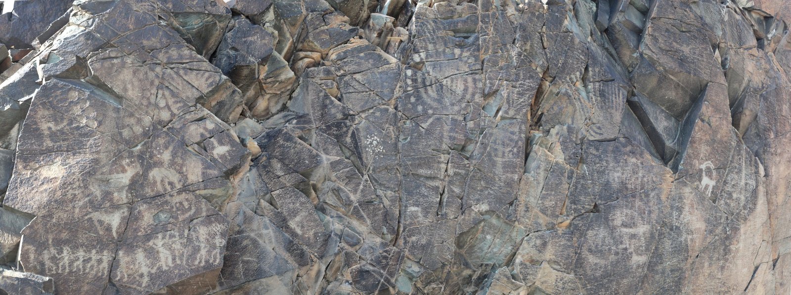 Sun-headed deity petroglyph carved into rock at Tamgaly, Kazakhstan