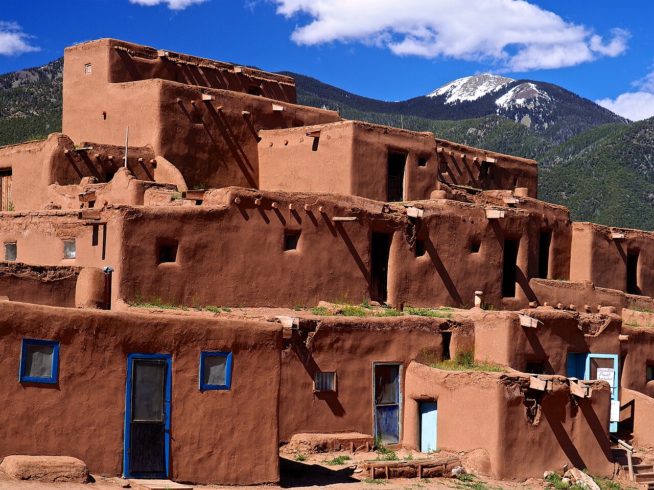 The multi-story adobe buildings of Taos Pueblo, New Mexico — the oldest continuously inhabited community in North America, inhabited for over 1,000 years