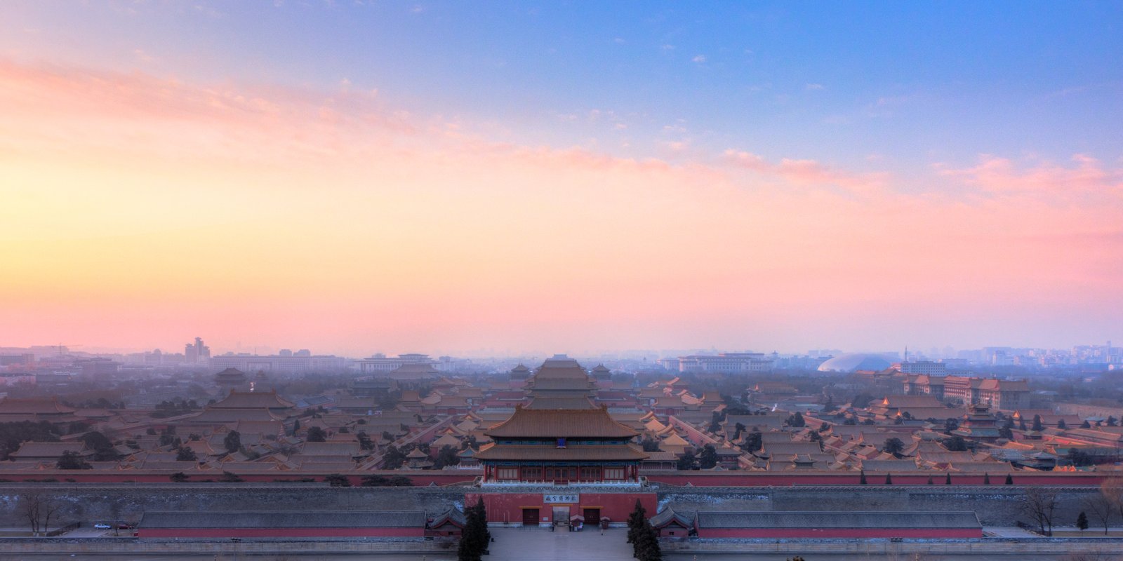 Aerial view of the Forbidden City's yellow-tiled rooftops seen from Coal Hill, Beijing