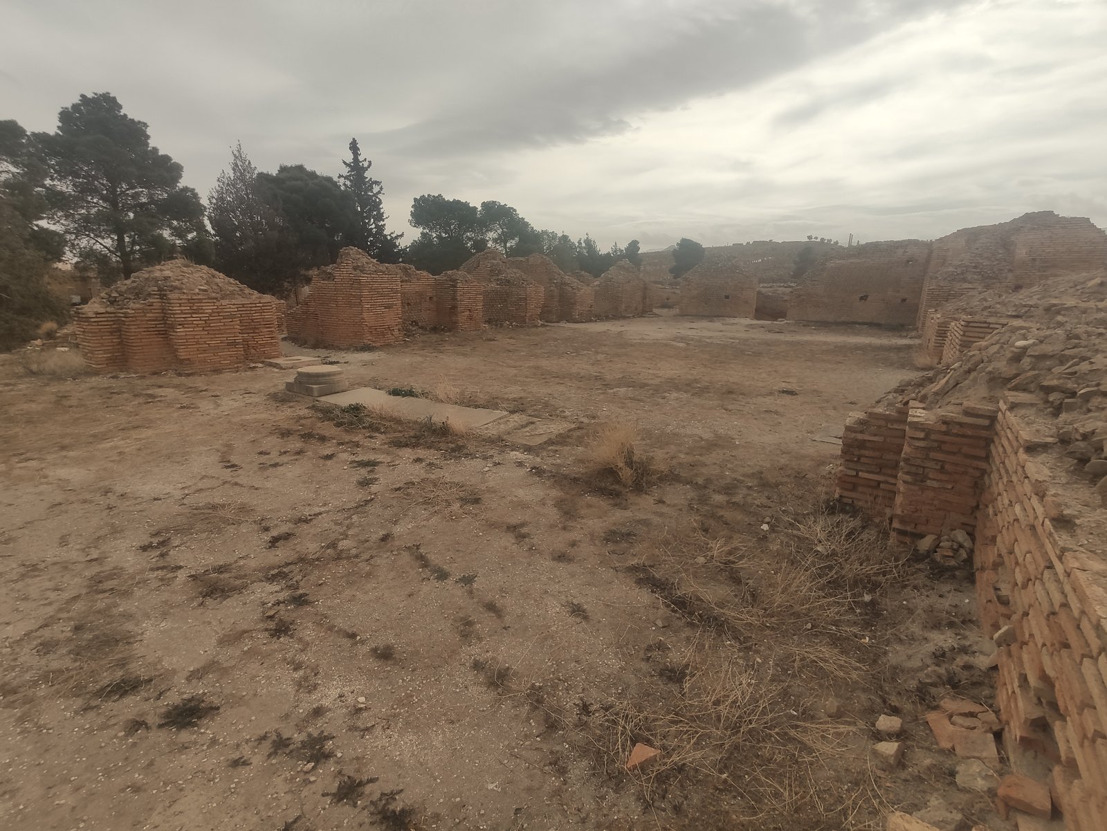 Aerial view of the Roman grid streets and Trajan's Arch at Timgad in Algeria