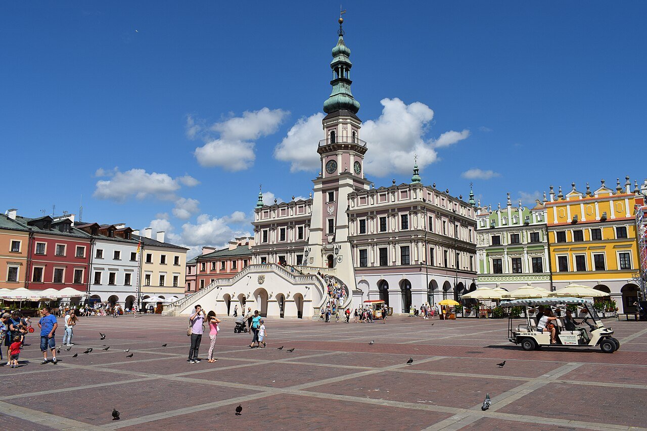 The Renaissance Town Hall of Zamość, Poland, with its arcaded loggia and elegant tower rising above Rynek Wielki