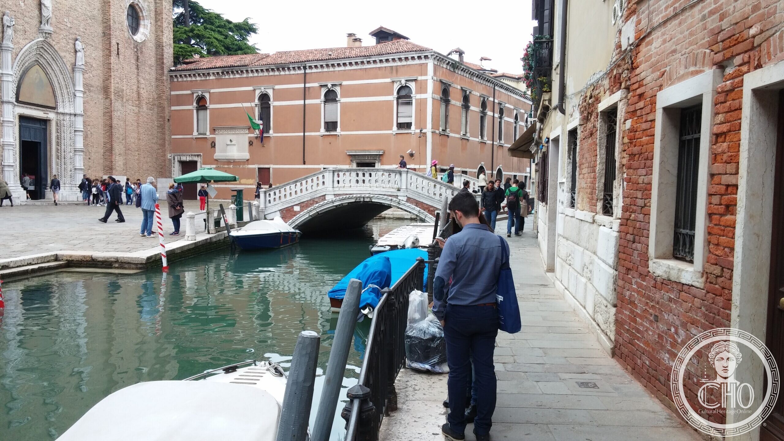The State Archive of Venice seen across the rio, with the flank of the Frari basilica on the left