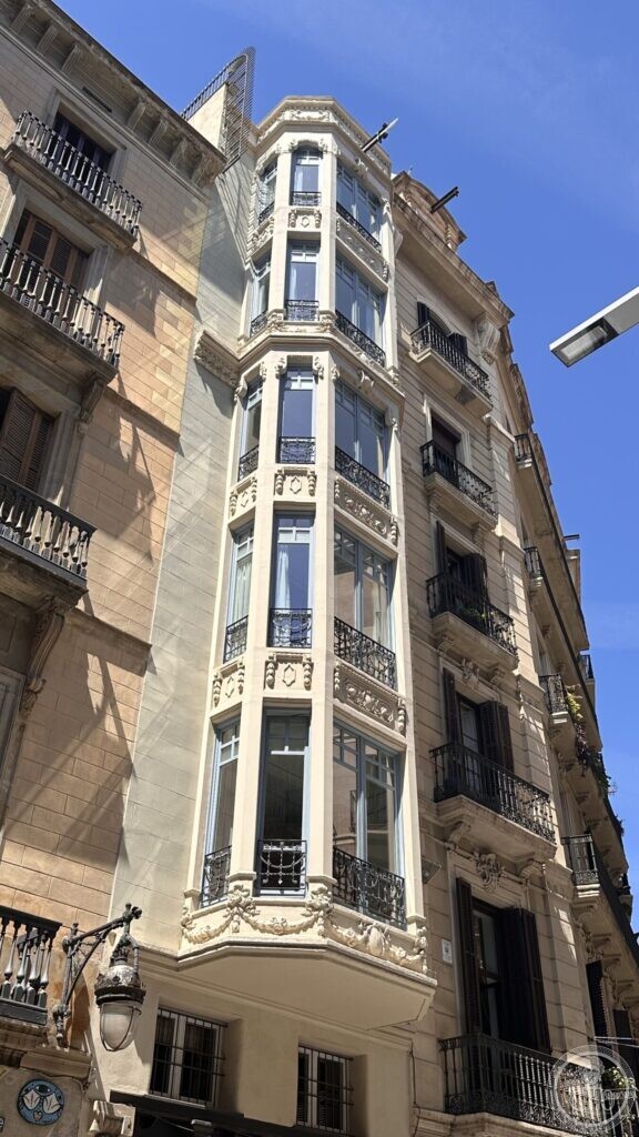 The same building from a little further along the street, with its neighbours on either side