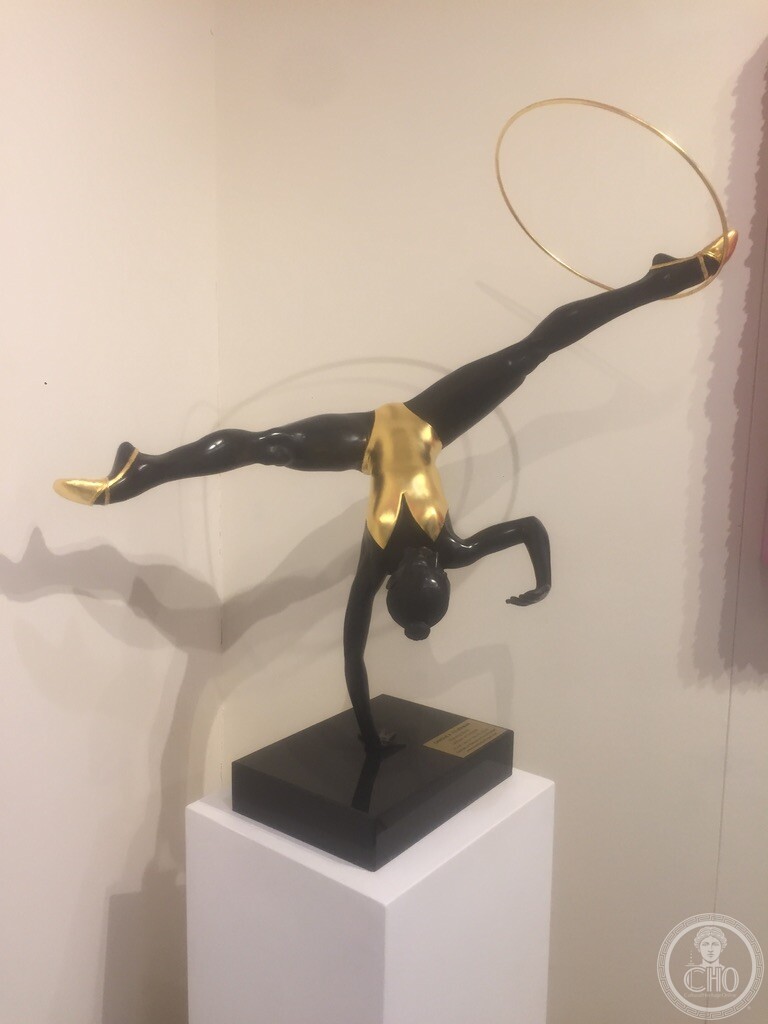 Black and gold sculpture of a gymnast with a hoop, on display at Bel-Air Fine Art, San Marco I, Venice