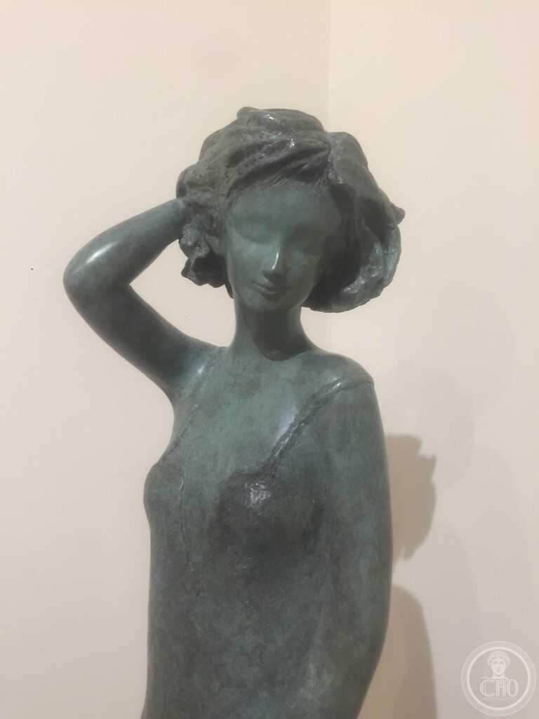 Patinated bronze female figure standing in gallery, Bel-Air Fine Art, San Marco I, Venice