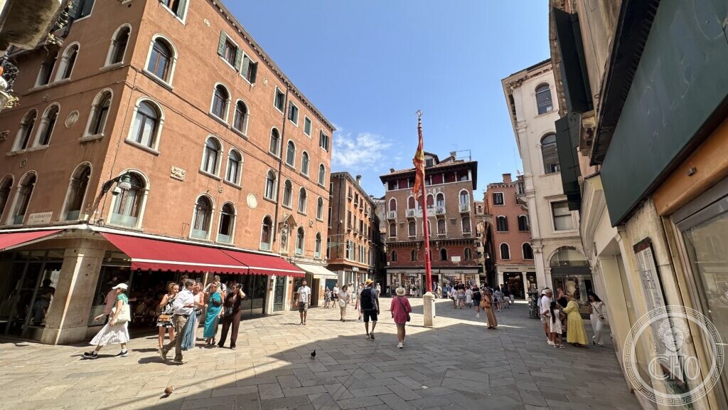 Campo San Luca in Venice, with the ceremonial flagpole in the centre and Gothic-Venetian palaces around the square
