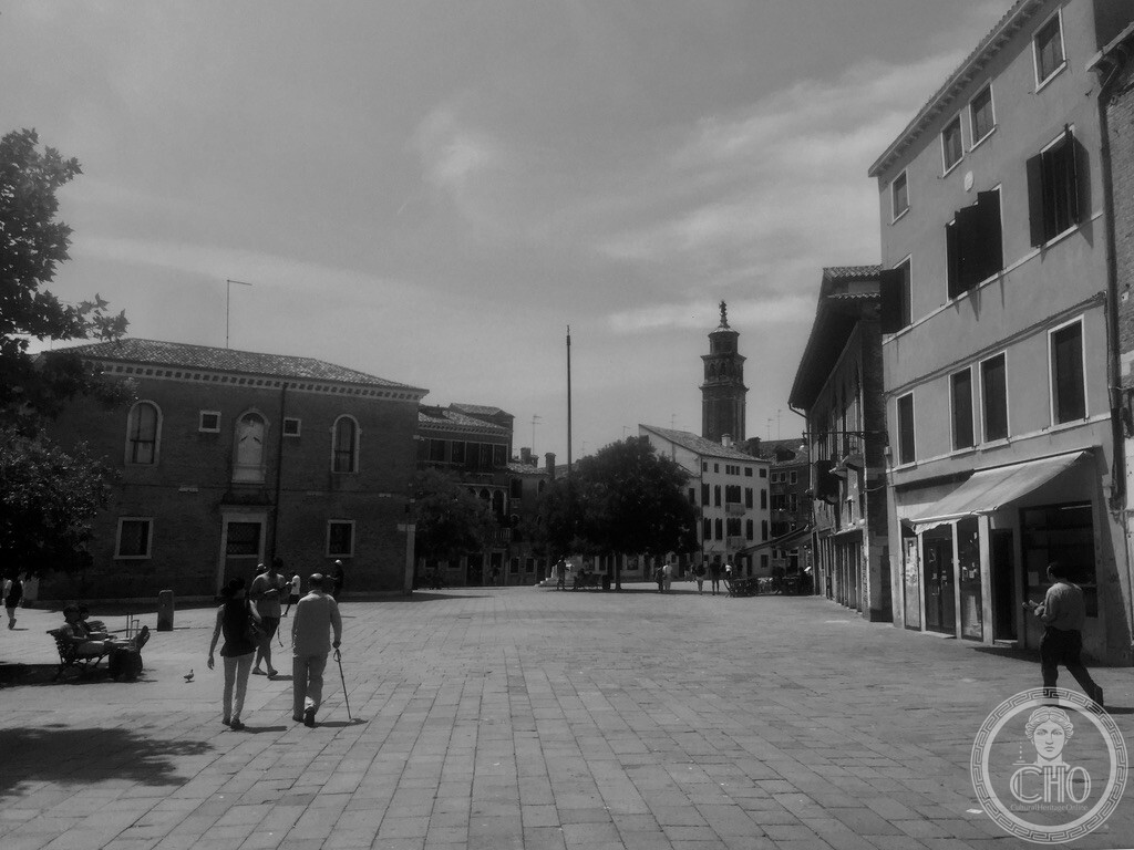 Black and white view of Campo Santa Margherita in Venice with the former church and the Carmini bell tower