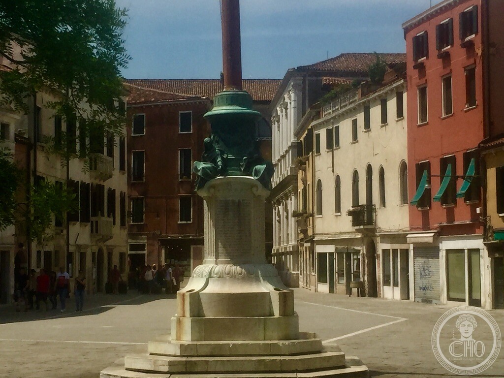 Monumental marble and bronze flagpole base (pilo portabandiera) war memorial in Campo Santa Margherita, Venice