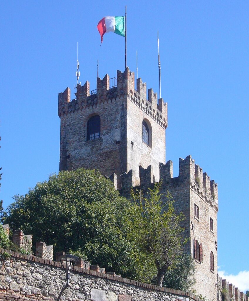 The medieval tower and battlements of the Castle of Conegliano overlooking the plains
