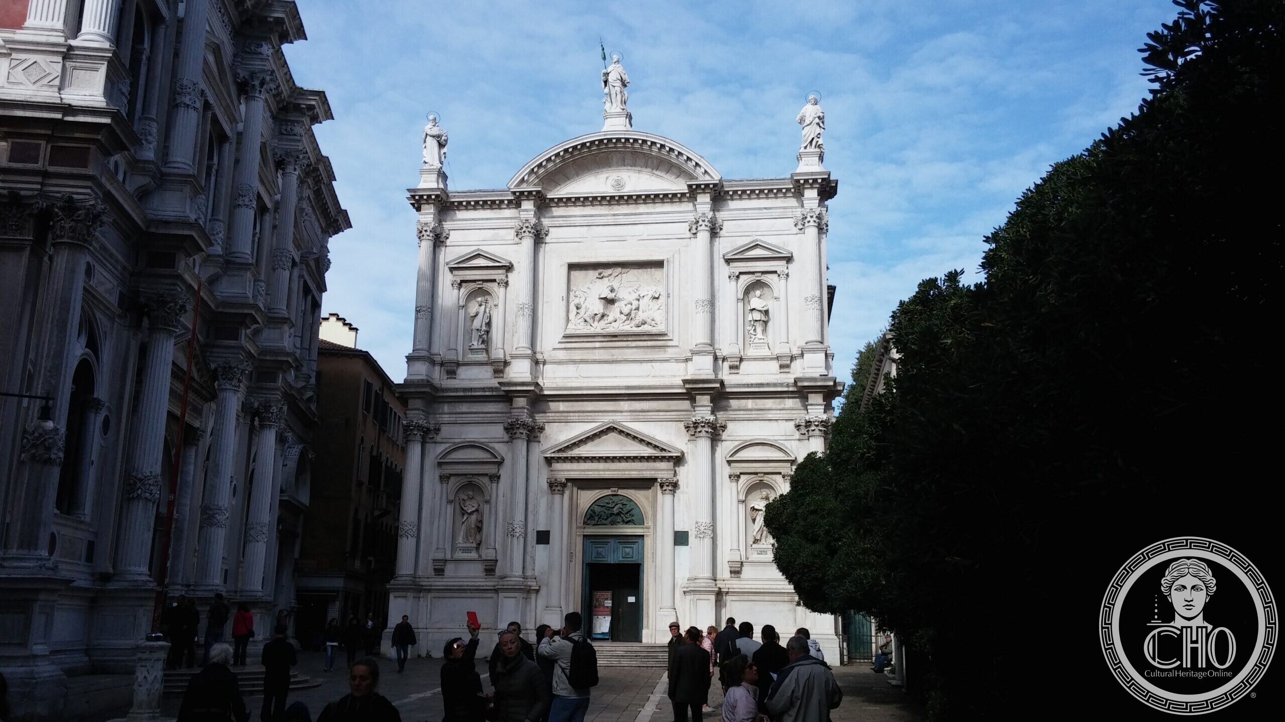 The eighteenth-century facade of the church of San Rocco in Venice, with statues along the cornice