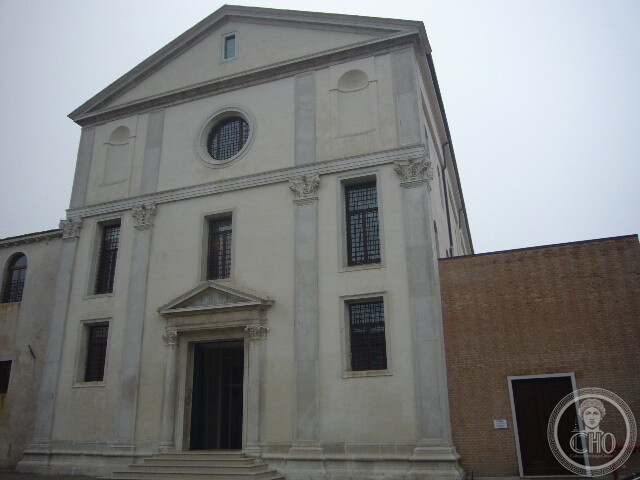 Renaissance facade of the former church of Santi Cosma e Damiano on the Giudecca, with pediment and oculus