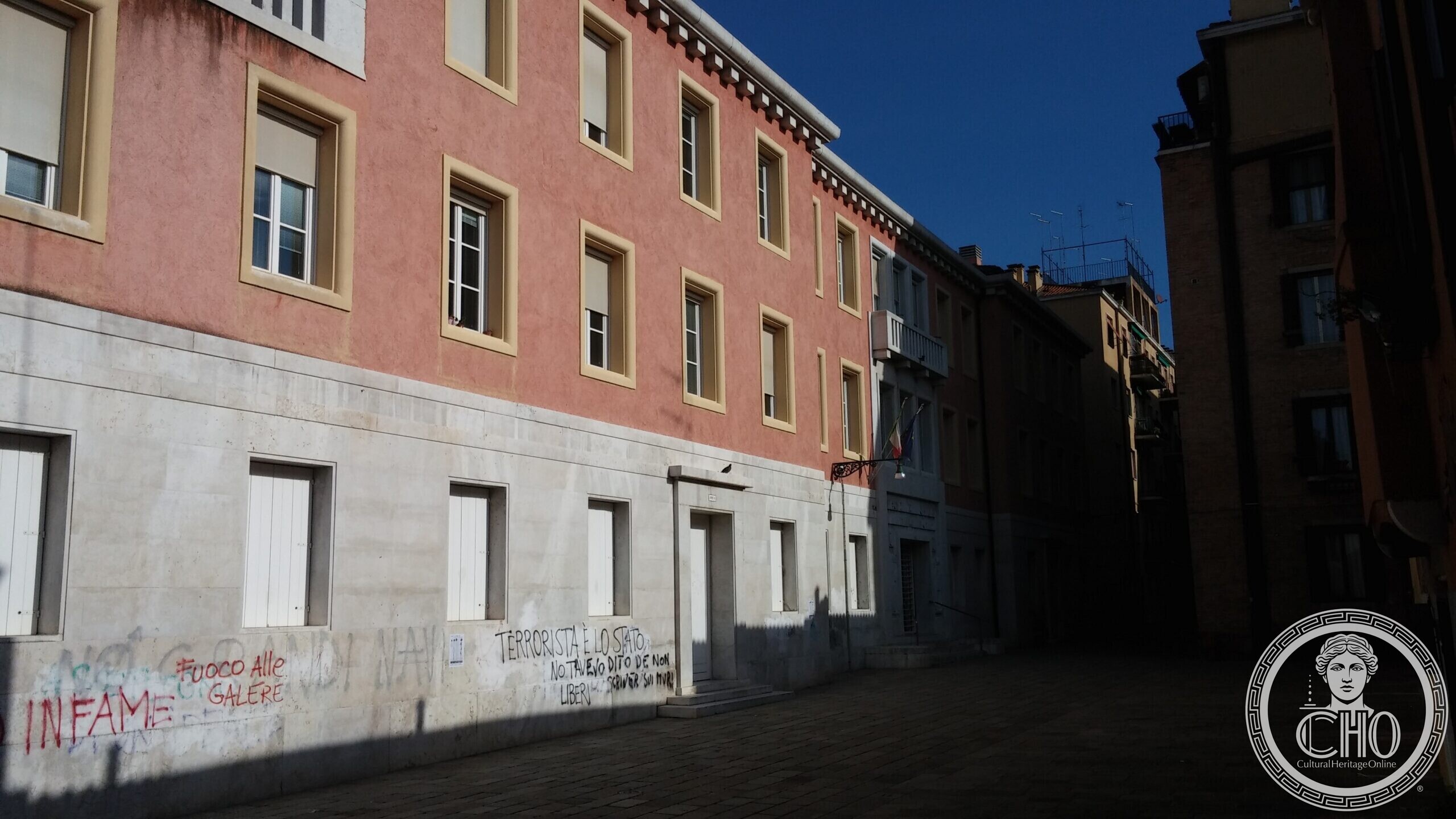 The former provincial hygiene office at Campo de la Lana in Venice, its stone base carrying graffiti