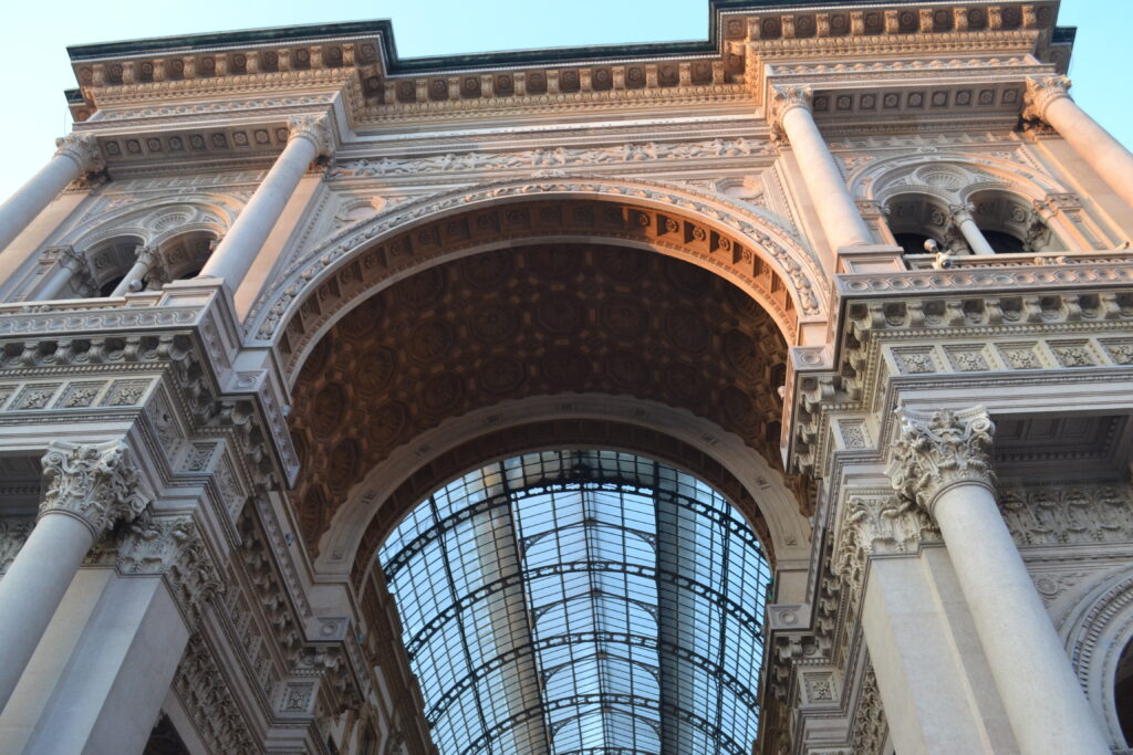 The soaring glass and iron barrel-vaulted arcade of Galleria Vittorio Emanuele II in Milan