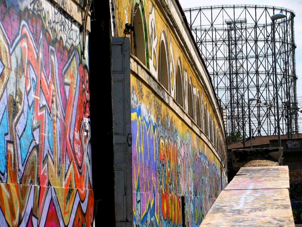 The metal lattice of the giant gasometer in Rome Ostiense near the Tiber