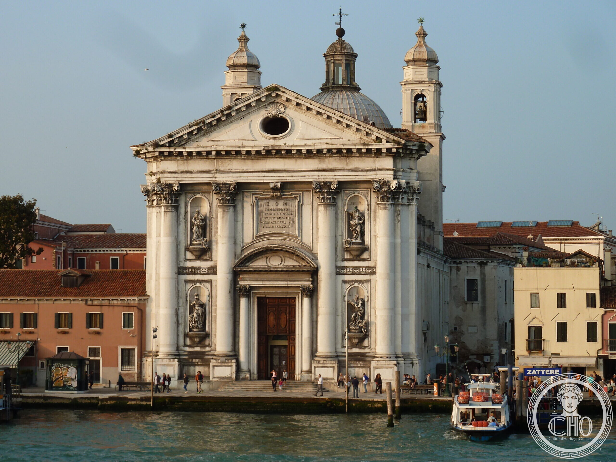 The facade of the Gesuati church on the Zattere in Venice, with its columns, statues and bell tower