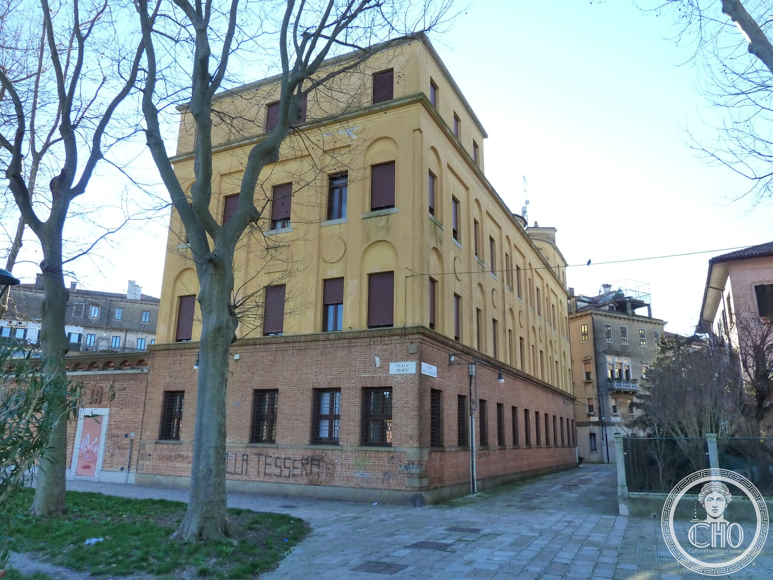 Gothic-Renaissance facade with wrought-iron balconies of the former Sant'Elena convent, now Hotel Indigo Venice, at the corner of Calle Buccari
