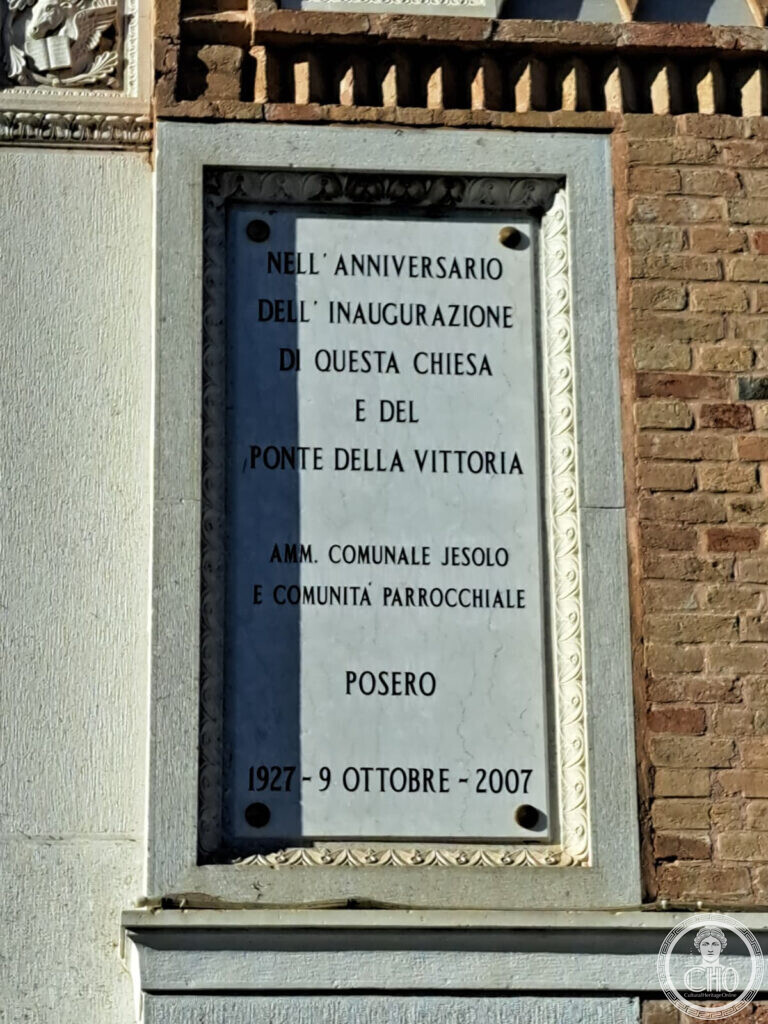 The marble tablet on the church of San Giovanni Battista at Jesolo recording the anniversary of the inauguration of the church and of the Ponte della Vittoria, 1927 - 9 October - 2007
