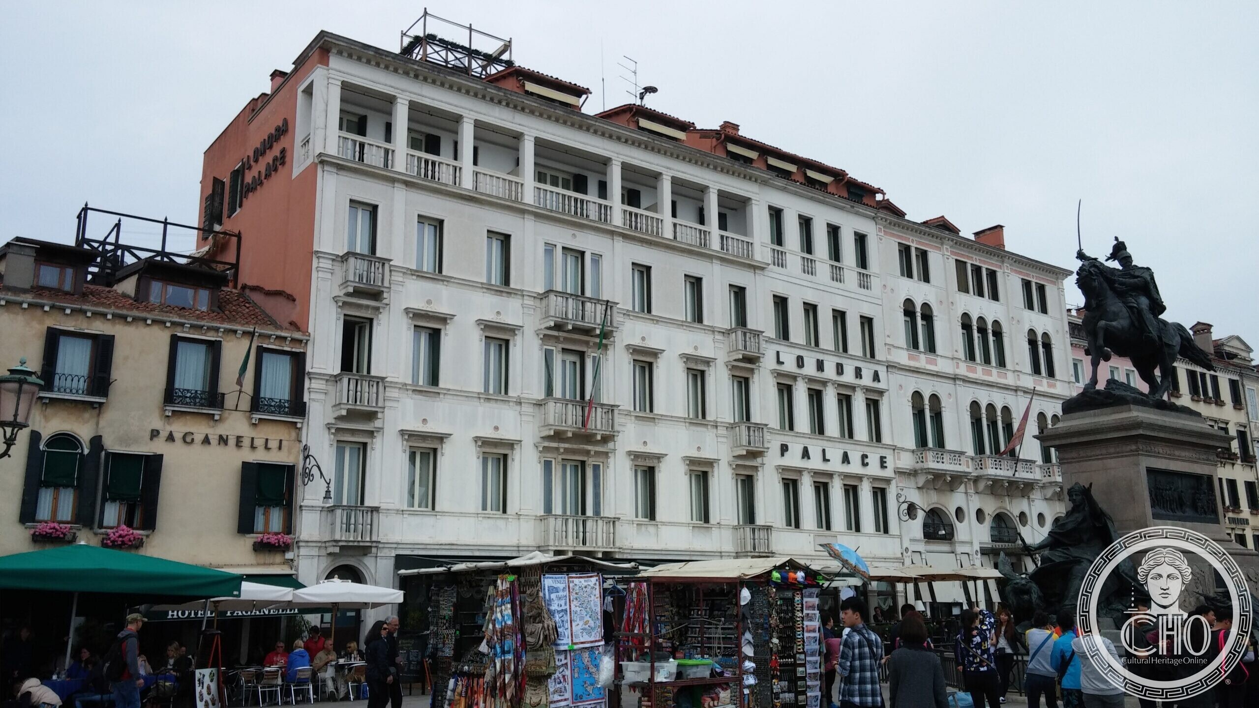 The Londra Palace hotel on the Riva degli Schiavoni in Venice, its long white facade beside the monument to Victor Emmanuel II