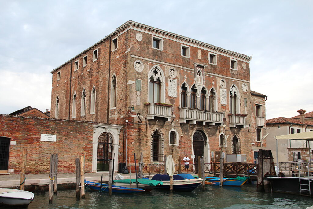 14th-century Venetian Gothic facade of Palazzo da Mula on the Canale degli Angeli in Murano