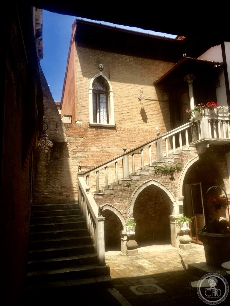 15th-century Gothic open staircase and courtyard of Palazzetto Corner in Campo Santa Margherita, Venice