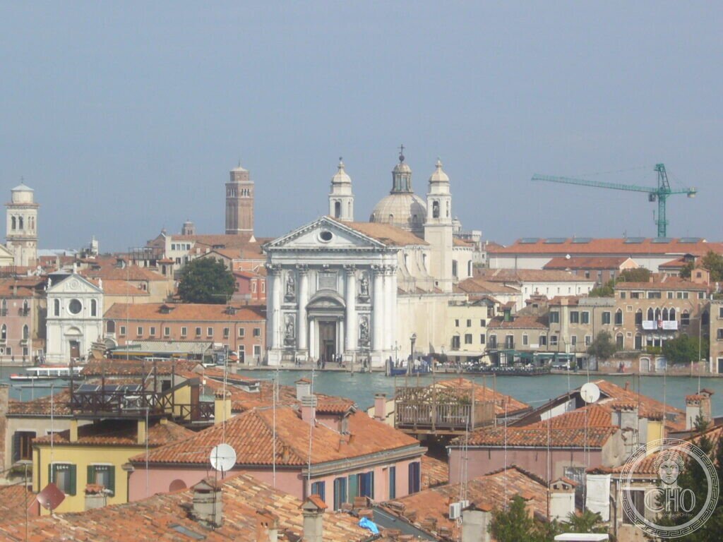 View over Giudecca rooftops across the canal to the Gesuati church on the Zattere
