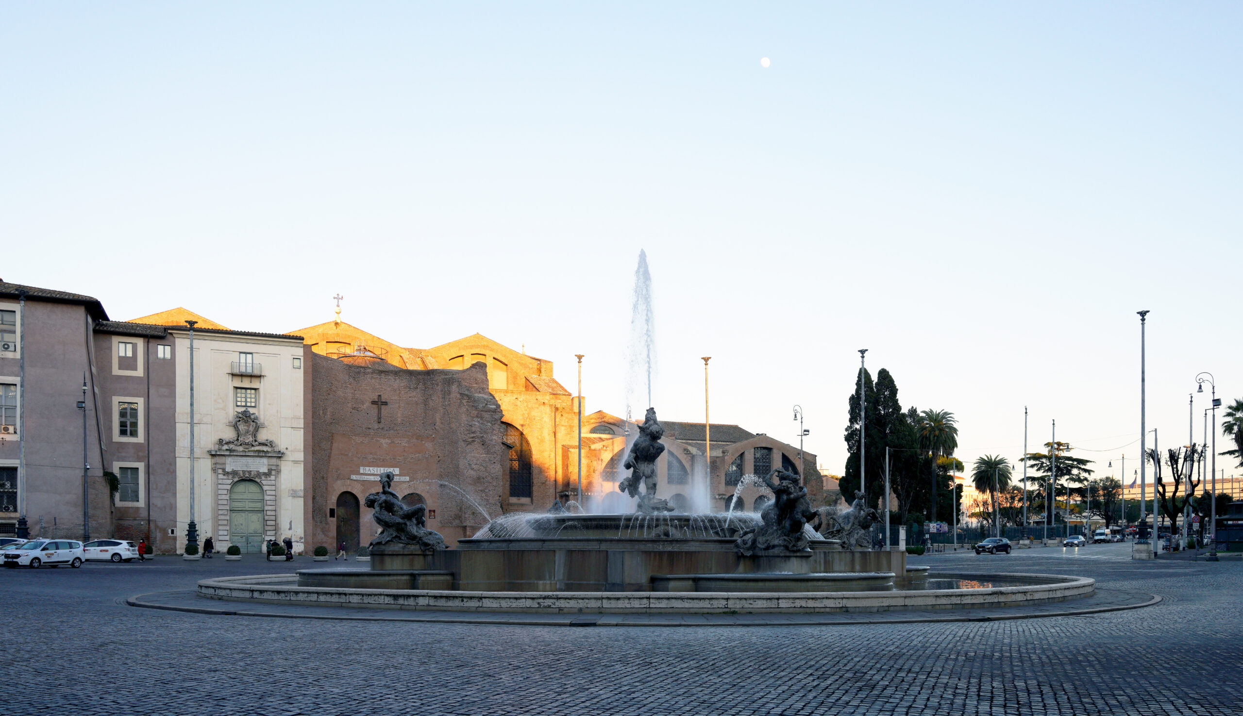 Panoramic view of Piazza della Repubblica (formerly Piazza Esedra) in Rome with the Fountain of the Naiads and semicircular palazzi