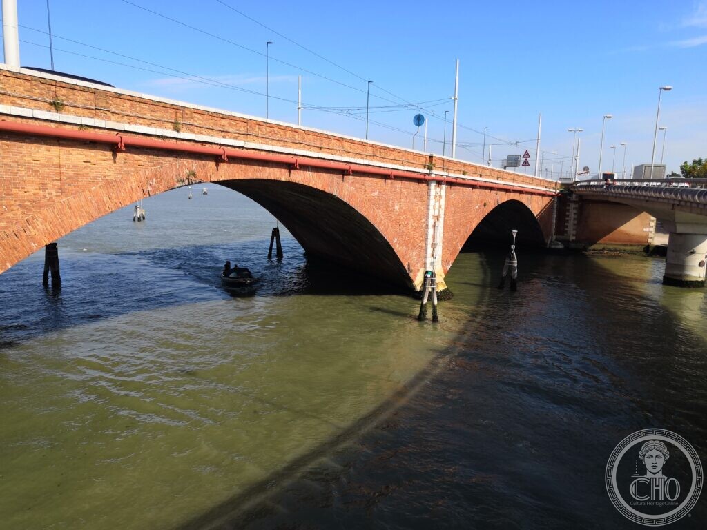 The brick arches of the Ponte della Libertà crossing the Venetian lagoon
