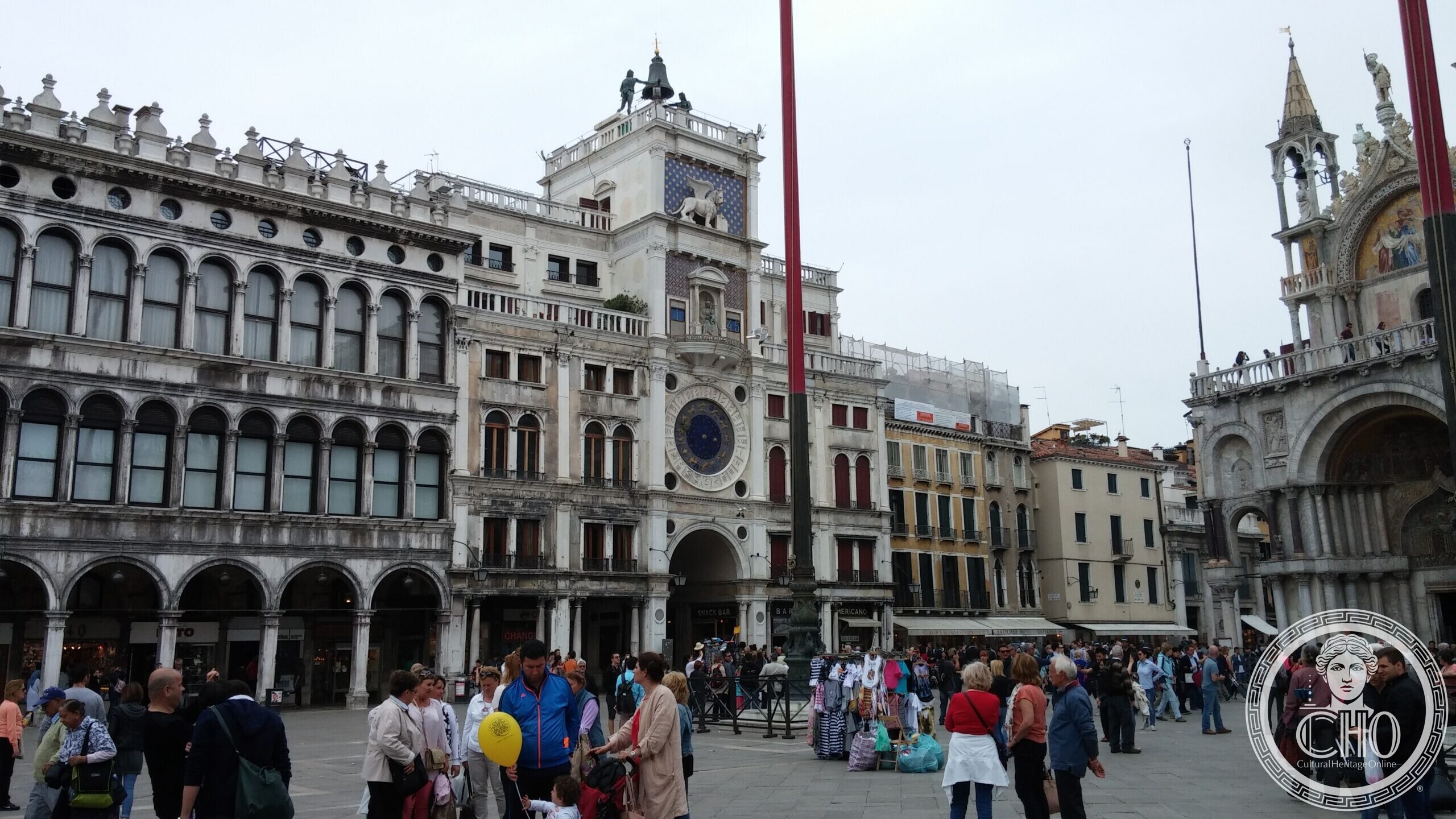 The Clock Tower of Piazza San Marco, with the bronze Moors on the terrace and the winged lion below