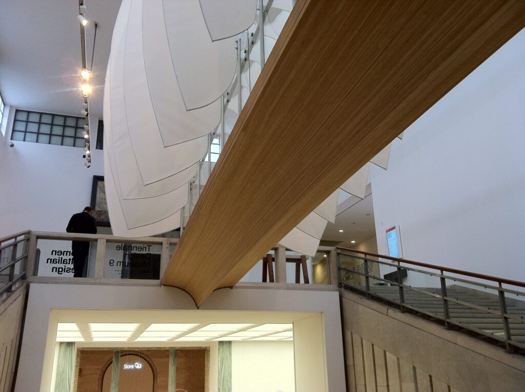 Interior of the Triennale Design Museum in Milan featuring mid-century Italian design icons