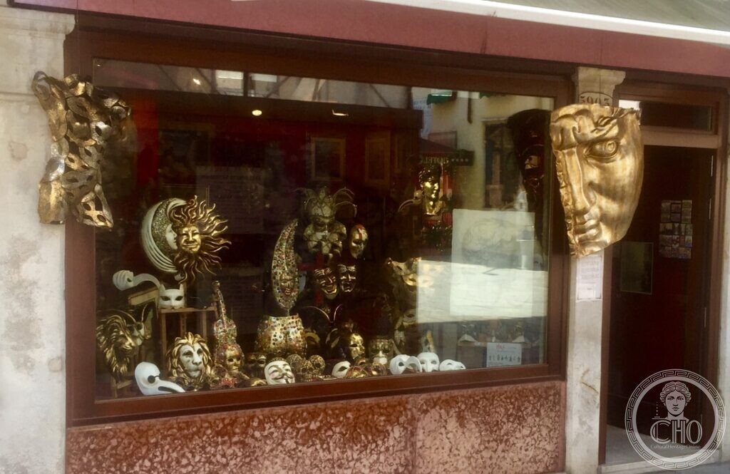 Shop window display of gilded and decorated Venetian Carnival masks