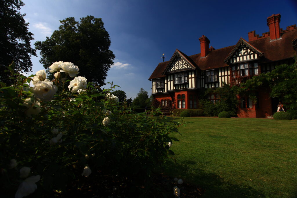 Wightwick Manor near Wolverhampton, a black and white timber-framed house with tall chimneys