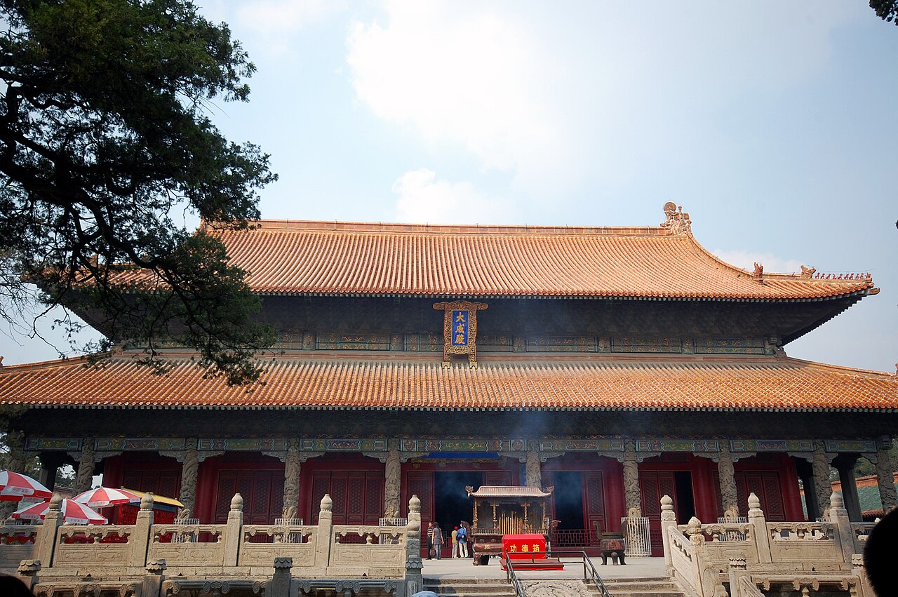 Dacheng Hall of the Temple of Confucius at Qufu with gilded carved dragon pillars and traditional double-eave hip-gable roof, Shandong Province, China