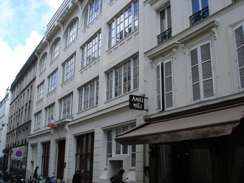 The entrance front of the ENSCI on the rue Saint-Sabin in Paris, a plain workshop building with large windows