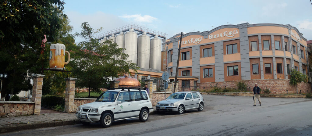 Historic red brick brewing halls and facade of the Birra Korça brewery in Korçë