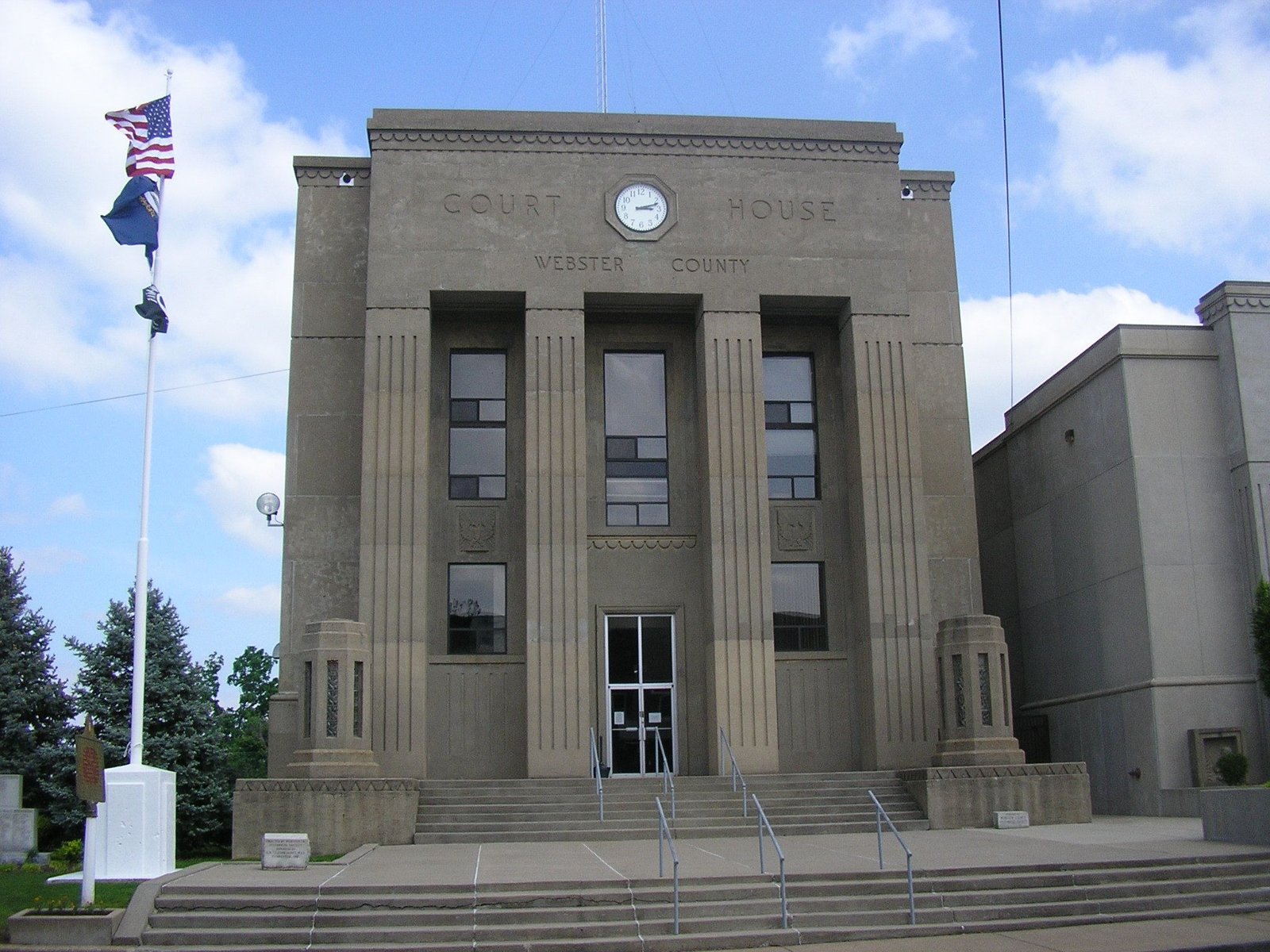 WPA Moderne courthouse in Dixon Kentucky 1940 with limestone facade and symmetrical fenestration designed by H Lawrence Casner