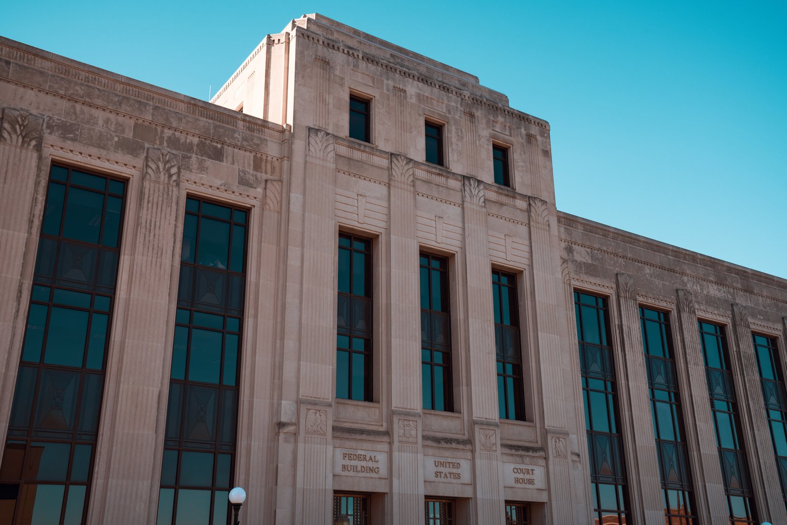 Art Deco Federal Building and United States Courthouse 1933 Sioux City Iowa E-shaped facade with stepped central tower and Indiana limestone cladding